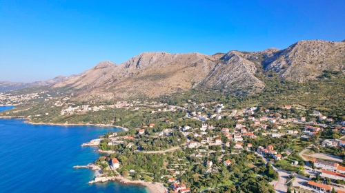 Attractive building land app. 820 m2 with a sea view | Location permit to build a Villa with a pool